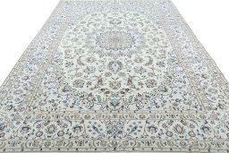 Surface texture of 2000s Nain rug with natural Wool and intricate pattern