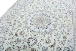 Backside of handmade 2000s Nain rug showing knot structure and weave density