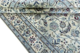 Close-up detail of 2000s Nain rug from Iran / Persia showing Wool weave