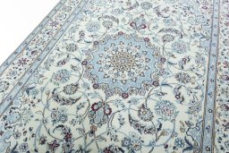 Backside of handmade 2000s Nain rug showing knot structure and weave density
