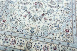 Close-up detail of 2000s Nain rug from Iran / Persia showing Wool weave