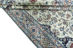 Close-up detail of New Nain rug from Iran / Persia showing Wool weave