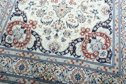 Close-up detail of New Nain rug from Iran / Persia showing Wool weave