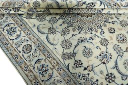 Close-up detail of New Nain rug from Iran / Persia showing Wool weave