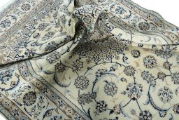Surface texture of New Nain rug with natural Wool and intricate pattern