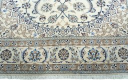 Full view of New Nain rug from Iran / Persia, 293 × 205 cm in Beige tones