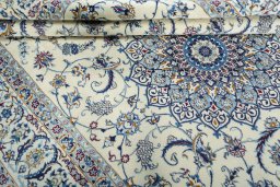 Close-up detail of 2000s Nain rug from Iran / Persia showing Wool weave