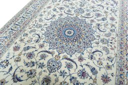 Backside of handmade 2000s Nain rug showing knot structure and weave density