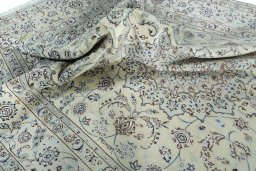 Surface texture of New Nain rug with natural Wool and intricate pattern