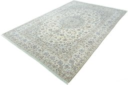 Corner detail of New Nain rug showing border pattern and Wool pile