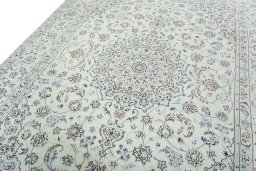 Backside of handmade New Nain rug showing knot structure and weave density