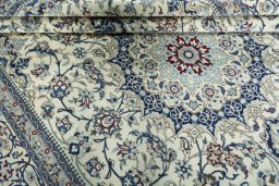 Close-up detail of 2000s Nain rug from Iran / Persia showing Wool weave