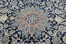 Central medallion detail of 2000s Nain rug from Iran / Persia