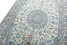 Backside of handmade Unknown Nain rug showing knot structure and weave density