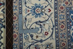 Backside of handmade 2000s Nain rug showing knot structure and weave density
