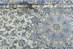 Close-up detail of 2000s Nain rug from Iran / Persia showing Wool weave