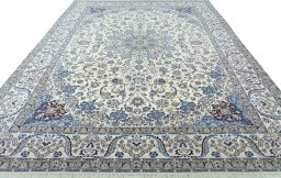 Surface texture of 2000s Nain rug with natural Wool and intricate pattern