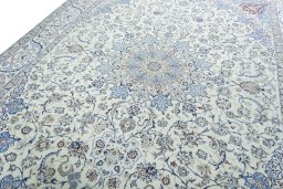 Backside of handmade 2000s Nain rug showing knot structure and weave density