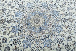Central medallion detail of 2000s Nain rug from Iran / Persia