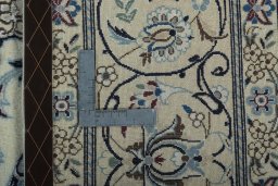 Backside of handmade 2000s Nain rug showing knot structure and weave density