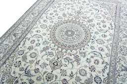 Backside of handmade 2000s Nain rug showing knot structure and weave density