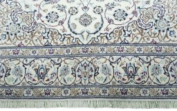 Full view of 2000s Nain rug from Iran / Persia, 305 × 201 cm in Beige tones