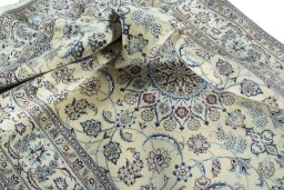 Surface texture of New Nain rug with natural Wool and intricate pattern