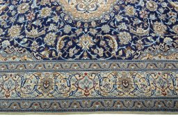 Corner detail of Unknown Nain rug showing border pattern and Wool pile