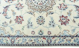 Full view of 2000s Nain rug from Iran / Persia, 136 × 91 cm in Beige tones
