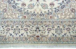 Full view of New Nain rug from Iran / Persia, 307 × 203 cm in Beige tones