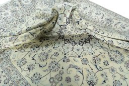 Surface texture of New Nain rug with natural Wool and intricate pattern
