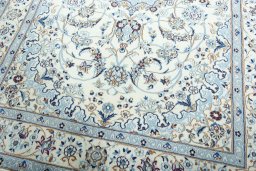 Close-up detail of 2000s Nain rug from Iran / Persia showing Wool weave