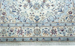 Full view of 2000s Nain rug from Iran / Persia, 298 × 199 cm in Beige tones