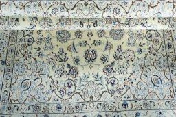 Close-up detail of 2000s Nain rug from Iran / Persia showing Wool weave
