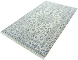 Corner detail of 2000s Nain rug showing border pattern and Wool pile