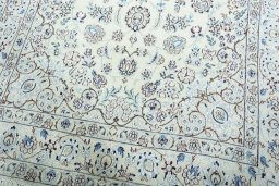 Close-up detail of 2000s Nain rug from Iran / Persia showing Wool weave