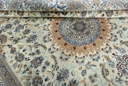 Close-up detail of 2000s Nain rug from Iran / Persia showing Wool weave