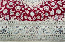 Corner detail of New Nain rug showing border pattern and Wool pile