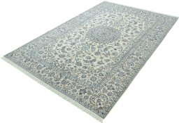 Corner detail of 2000s Nain rug showing border pattern and Wool pile