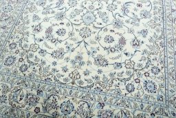 Close-up detail of 2000s Nain rug from Iran / Persia showing Wool weave