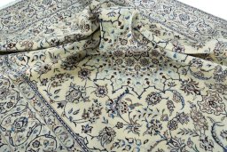 Surface texture of New Nain rug with natural Wool and intricate pattern