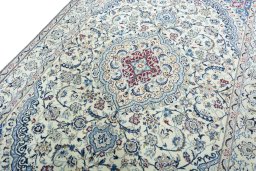 Backside of handmade 2000s Nain rug showing knot structure and weave density
