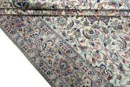 Close-up detail of 2000s Nain rug from Iran / Persia showing Wool weave
