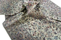 Surface texture of 2000s Nain rug with natural Wool and intricate pattern