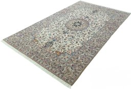 Corner detail of 2000s Nain rug showing border pattern and Wool pile