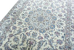 Backside of handmade 2000s Nain rug showing knot structure and weave density