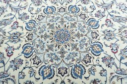 Central medallion detail of 2000s Nain rug from Iran / Persia