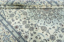 Close-up detail of 2000s Nain rug from Iran / Persia showing Wool weave