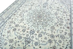 Backside of handmade 2000s Nain rug showing knot structure and weave density