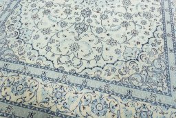 Close-up detail of 2000s Nain rug from Iran / Persia showing Wool weave